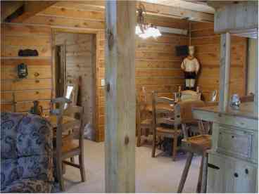 2 round Cantina styled tables seat 8, with seating for 2 more at the Western styled bar.
A Cowboy/Deadwood style home that you\'ll enjoy!