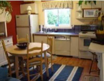 Large fully equipped kitchen with seating 