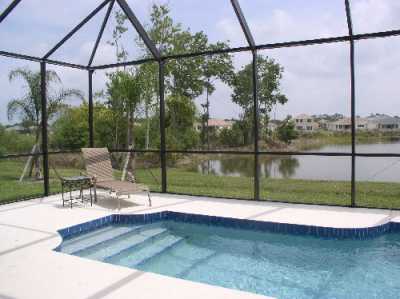 Key shaped pool with lake view