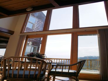 Fabulous wall of windows on the main level ~ The chalet has 3 levels! There are big windows in every room so that you can enjoy the terrific views!