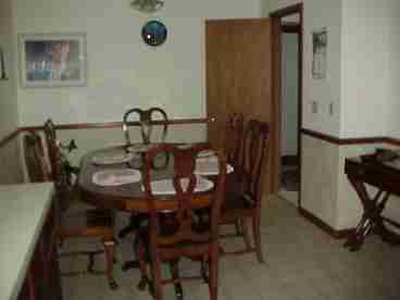 Large Dining Area with Rosewood Furnishings.