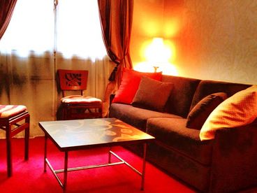 Low couch & office area in living room