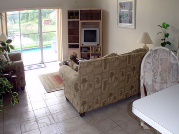 Family room overlooking the pool and lake