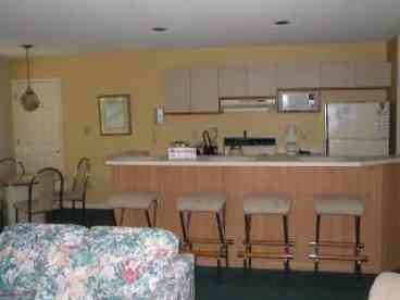 Fully equipped kitchen with refrigerator, dishwasher, microwave, coffeemaker & toaster. 