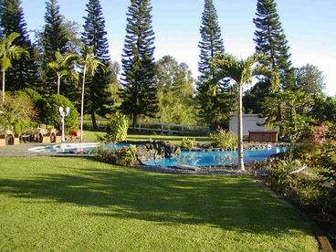 Yard is large enough for yard games or events.  Two pools with lava rock waterfalls