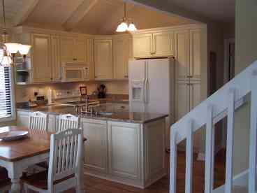 New kitchen cabinets, new appliances, and granite counters