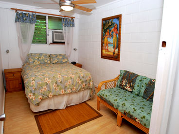 Bedroom - Queen bed & bedding. Also AC unit and ceiling fan.