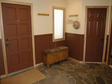 Large entry hall has room to change and large closets for your coats and boots.
