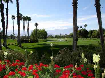 Gorgeous golf and mountain views await you as you enter The Lakes Country Club!