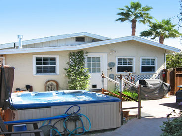 $10,000 hot Tub with Many Jets and a changing colors waterfall!