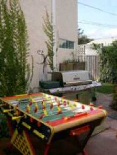 Backyard Foosball table and Stainless steel BBQ and $10,000 multi-jet hot tub.  Yard is pet friendly with Outside shower.