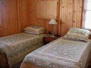 Guest bedroom with twin closets,