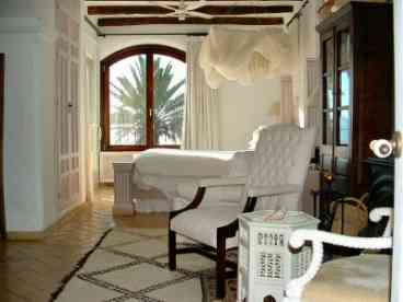 Main bedroom faces south and opens onto covered terrace