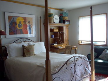Master Bedroom overlooks Tomales Bay and has a Queen 4 poster bed