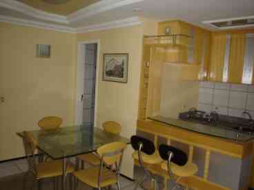 full kitchen with stove, microwaves, refrigerator and more 