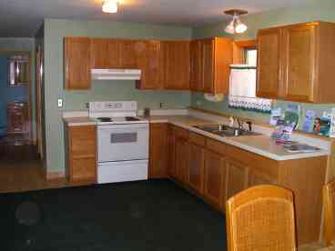 FULL KITCHEN with attaching Dining room, there is a refridgarator, but not in the picture, its off to the left on the other wqll