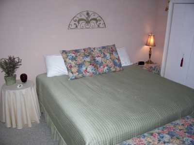 Slumber comfortably in your large bedroom with plush KINGSIZE Simmons Beautyrest BED, luxury 400 thread count sheets and a selection of pillows, including a contour memory foam.  Enjoy the vanity and lighted make-up mirror.  Curl up in the comfortable chair and relax with a good book.