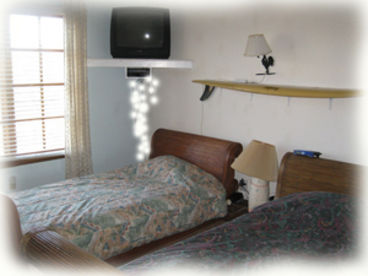 Two sleigh beds, and 2 single roll-away beds are provided. (Can sleep 8 in beds)