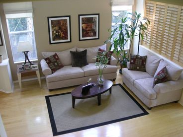 Formal 2 story living room, perfect for conversation, entertaining or relaxing.