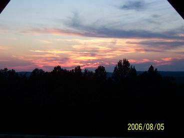 Breathtaking sunsets are best viewed from the 12 foot wrap around porch.  Views like this are the norm most evenings.