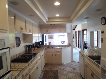 Ocean views from the kitchen and dining room. Kitchen has new flooring, new appliances, new lighting