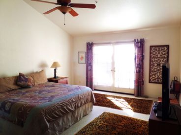 Wonderful Views, not only has an overhead fan, but the condo also has A/C. Large flat screen cable tv