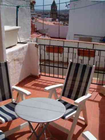 Outside Area: Partially covered sunny roof terrace with patio table and 8 chairs for outside dining, two sun loungers and a BBQ. Above the terrace there is also a small balcony reached via some steep winding steps which has a fantastic panoramic view of Velez-Malaga and the surrounding area. 

As with many traditional village houses in the region, although the house is accessible by car it is not possible to park adjacent to the property. However there is plenty of parking available within a couple of minutes walk away.
