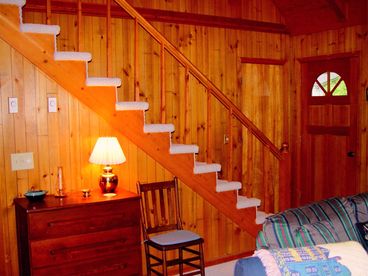 Stairway to third level 600 sq. ft. master suite with full bath & private balcony.