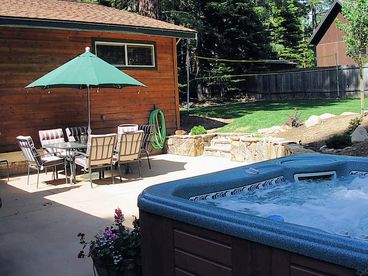 The house is on a 1/3 acre lot,  and we have a Newly  Landscaped fenced Back Yard with Badminton in the summer. There is a Huge New HOT TUB under the stars.