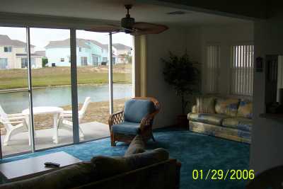 Living Area with the view of the lake- Palm leaf Design Ceiling Fan to enjoy and Relax.