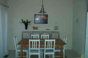 Dining area, table extends to seat 10