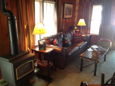 Living room with comfortable camp furniture.

