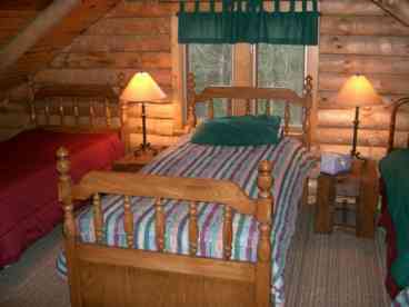 1 of 5 twin beds in loft