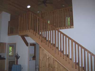 Stairs to loft overlooking Great room.