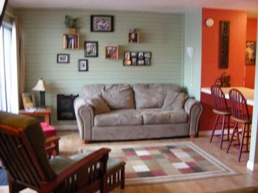 Living room area with queen size sleeper sofa - No cramped bunk beds here!