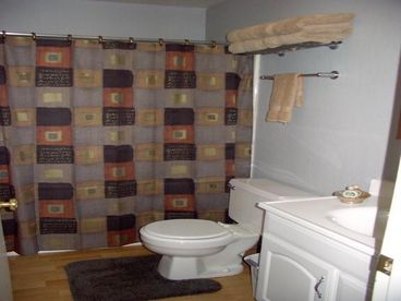 One bathroom with tub/shower combo
