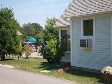 Looking towards our front door and the heated pool which is right outside of our cottage.