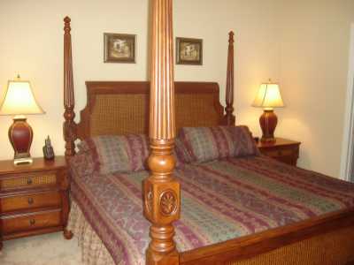 This nicely appointed master bedroom has its own bathroom and walk in closet.