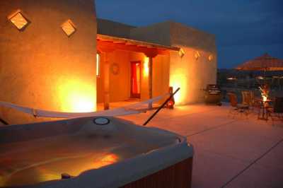 Jacuzzi and Hammock on Patio at Night