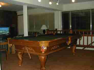 New Pool Table in den with fireplace and large screen tv