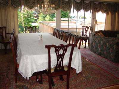 Deck off living area offers a large hot tub, and a slight view of the sound just 2 blocks away.  