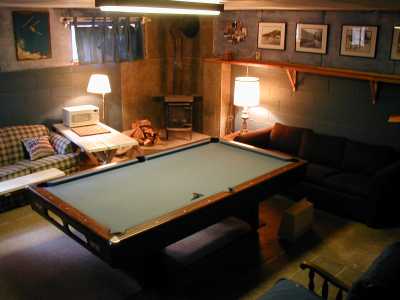Seperate Family room with a full size pool table and a wood stove.
