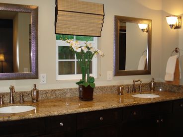 Covered pool cabana with refrigerator and BBQ. Access from dining room.