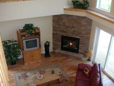 Relax by the stone fireplace