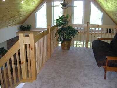 The loft with sleeping area and TV/game area