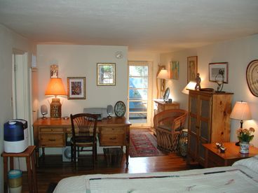 View from bedroom towards back patio showing office area.