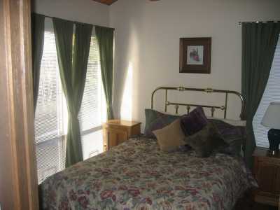 Bedroom on second floor with queen sized bed