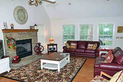Plenty of comfortable seating, hardwood floors, fireplace for winter evenings