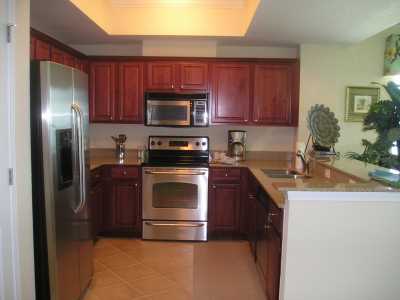 Kitchen in 3 br unit. Stainless appliances and everything you will need for the week.