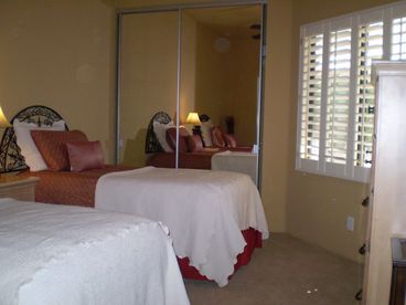 Attached bathroom, twin beds and plenty of storage